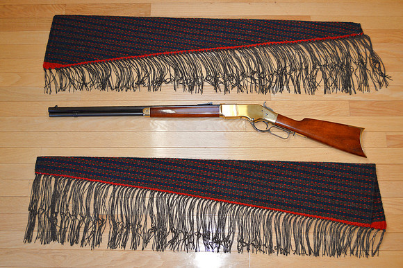 Rifle scabbards 38 and 39